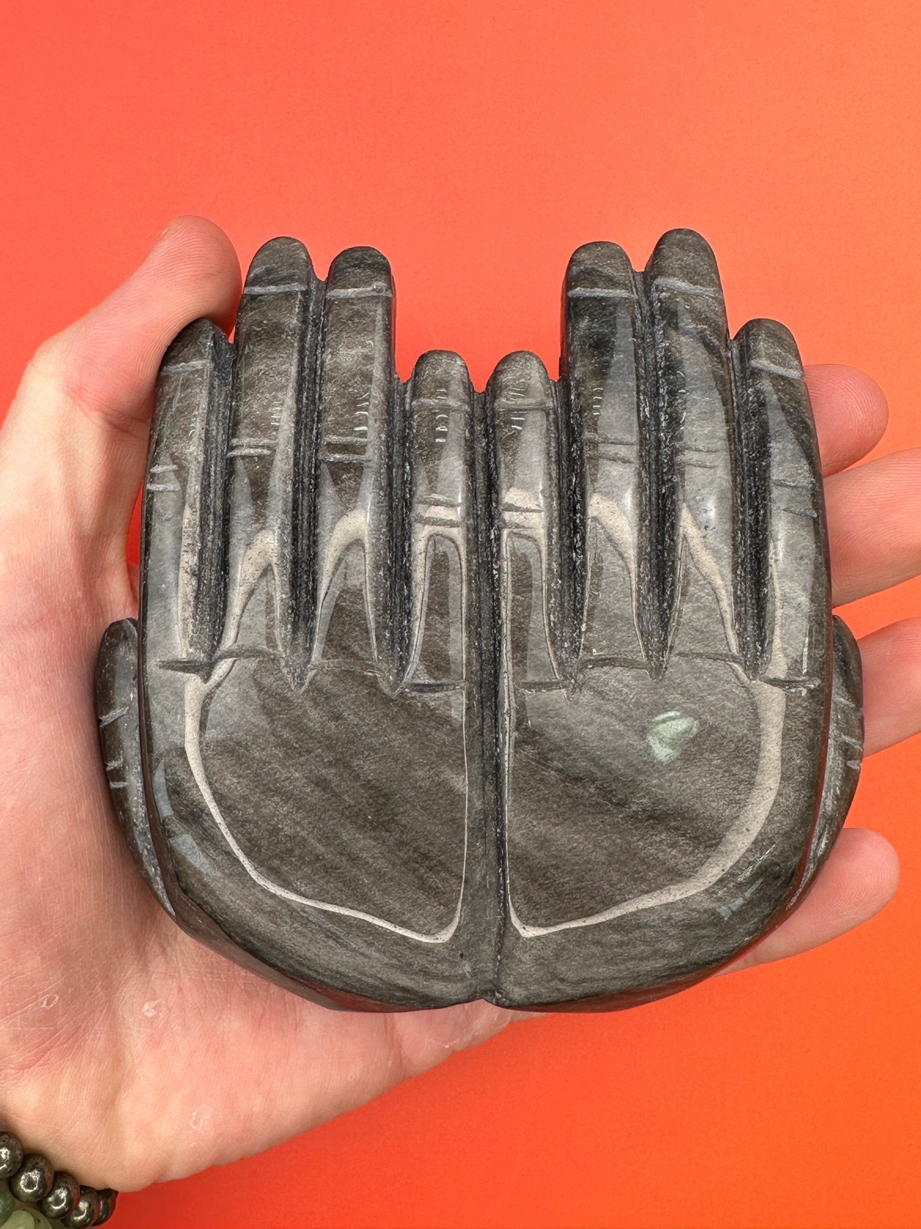 Silver sheen obsidian - Receiving hands