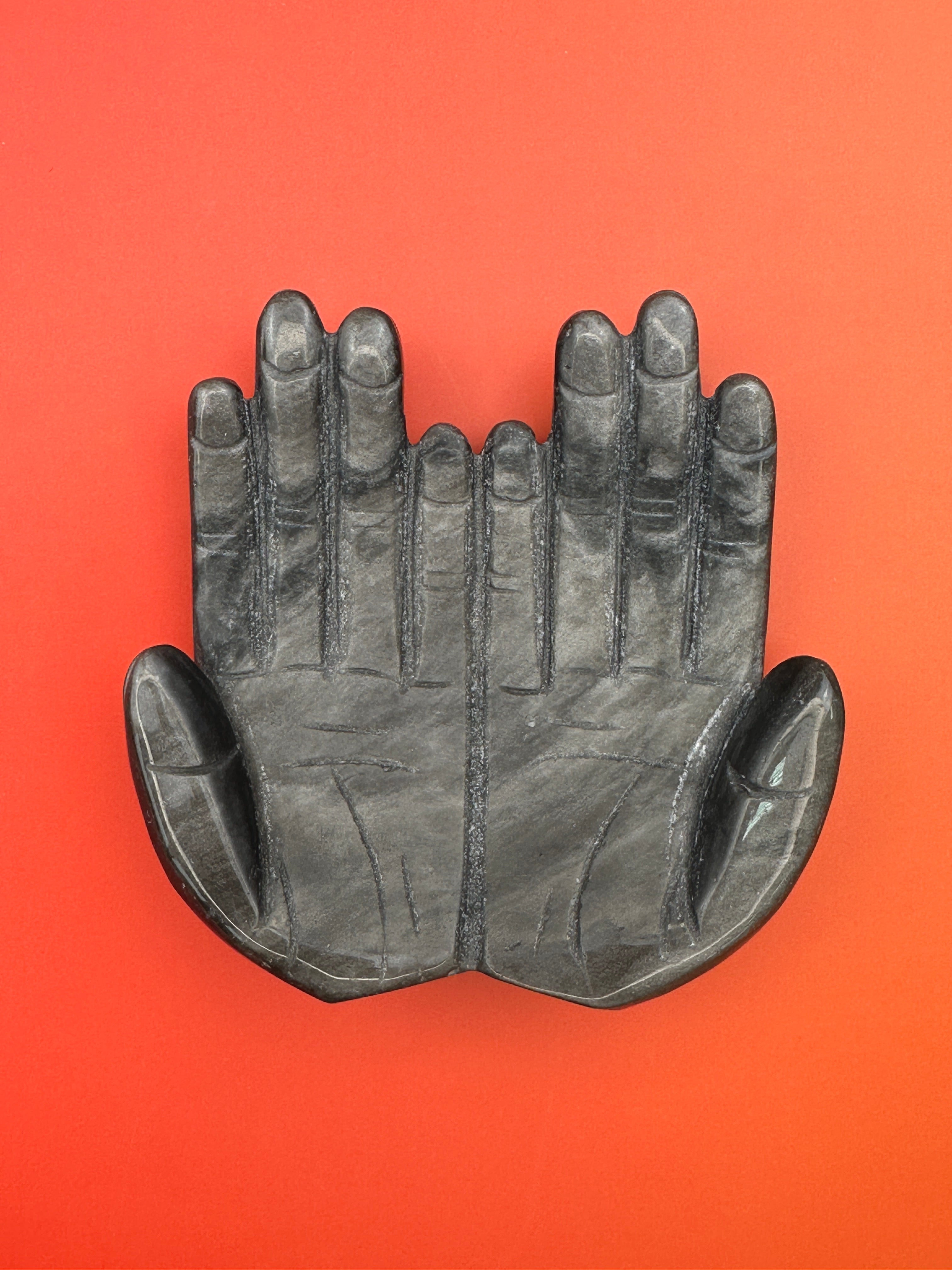 Silver sheen obsidian - Receiving hands