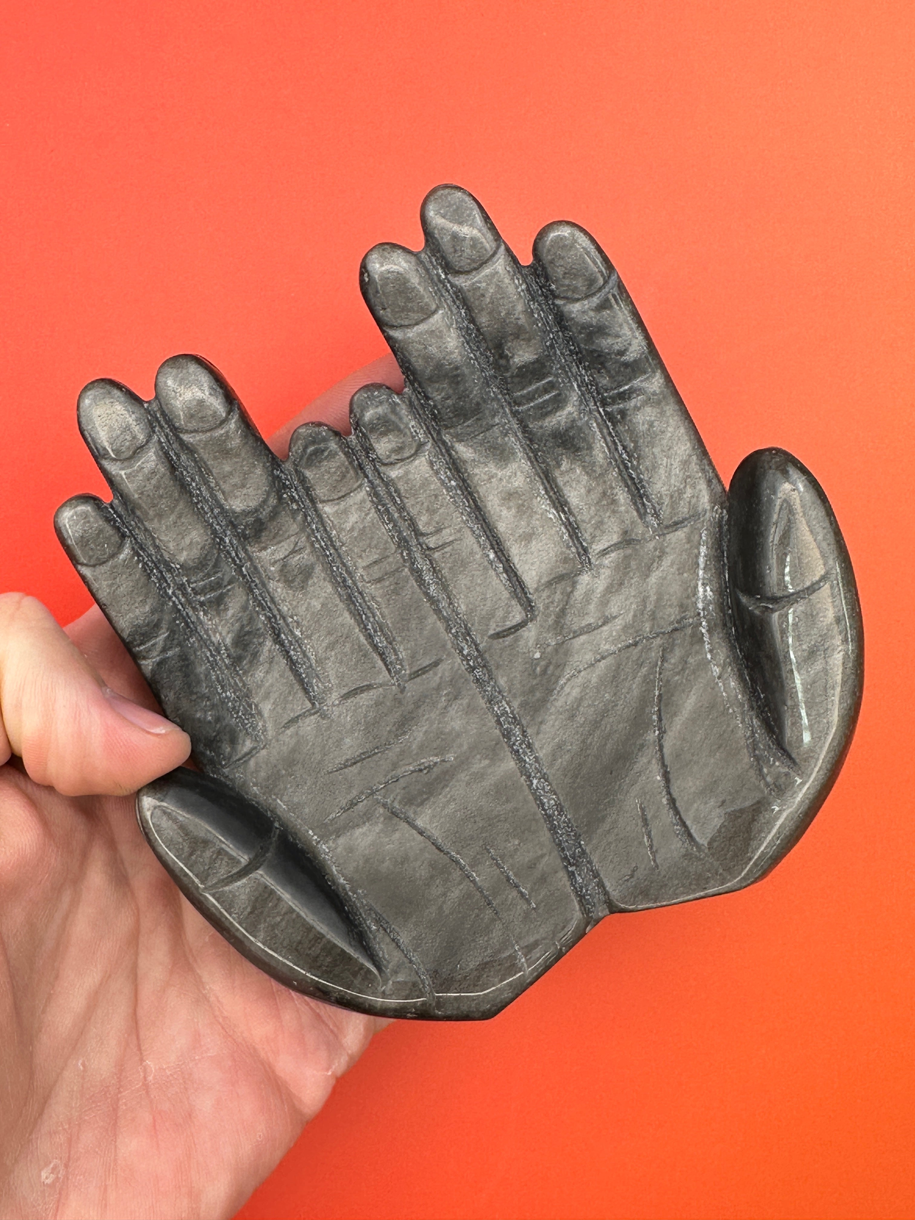 Silver sheen obsidian - Receiving hands